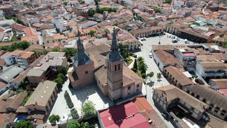 Orbital-view-Over-Parish-Church-of-Our-Lady-of-the-Assumption-in-Naval-Carnero,-Spain