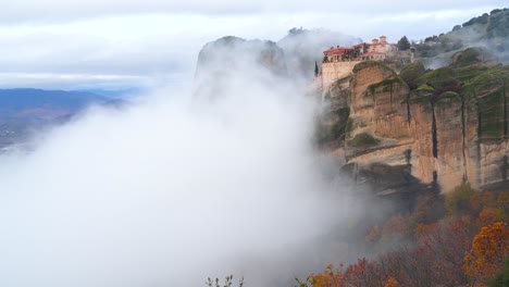 4K-Epic-Foggy-Landscape,-Beautiful-Meteora,-Monastery-on-a-mountain-above-the-clouds