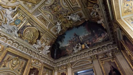 detailed view of louvre's ornate ceiling