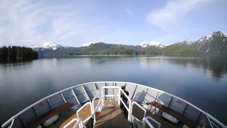 Point-of-view-time-lapse-from-a-ship\'s-bow-cruising-into-Kelp-Bay-off-of-Baranof-Island-in-Southeast-Alaska