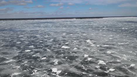 ice yachts racing across the frozen water of muskegon lake