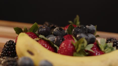 Blueberries-being-dropped-onto-a-pile-of-spinning-fruit