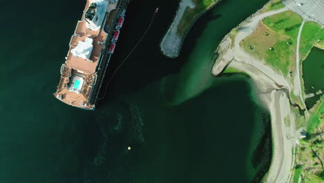 norwegian cruise ship moored at the port of flam in norway