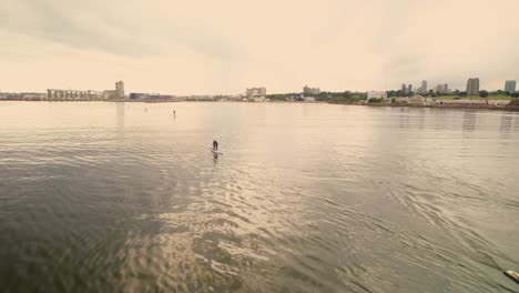 aerial over nautic club paddle boarders in mar del plata port, argentina