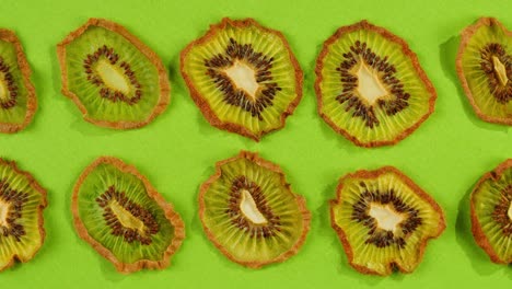 kiwi slices close up background of green, fresh fruit texture.