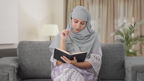 muslim woman writing a diary