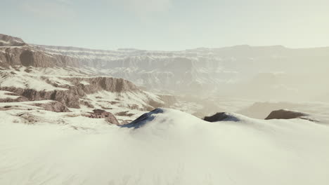 rocks covered in snow in ski resort