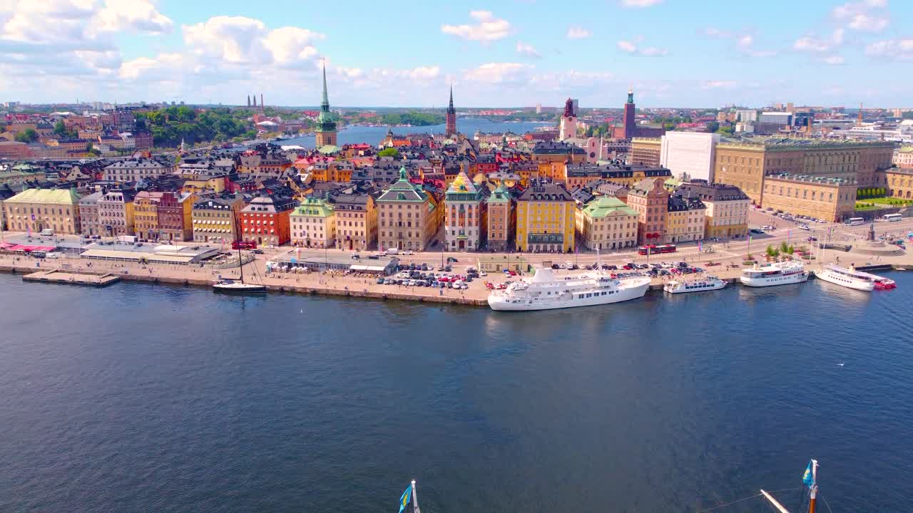 Stunning aerial view of Stockholm, Sweden, river with parked cruise ships alongside beautiful architectural buildings, vibrant essence of city.