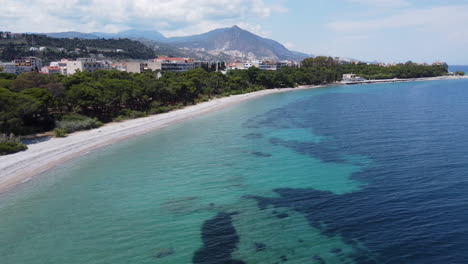 the small town of xylokastro, greece features pristine beaches and clear water