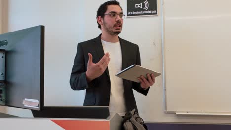 modern classroom: speaker with interactive tablet