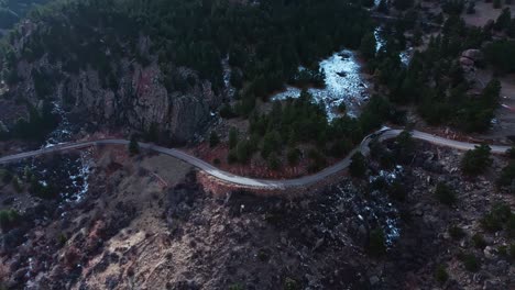 a dynamic drone orbit of boulder flatirons under soft evening light, showcasing their beauty