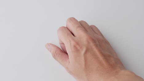 close view of indonesian rupiah coins held in a hand