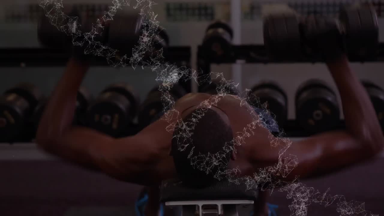 dna 가닥이 회전하는 애니메이션 체력 있는 남자가 무게로 운동하고 있습니다.