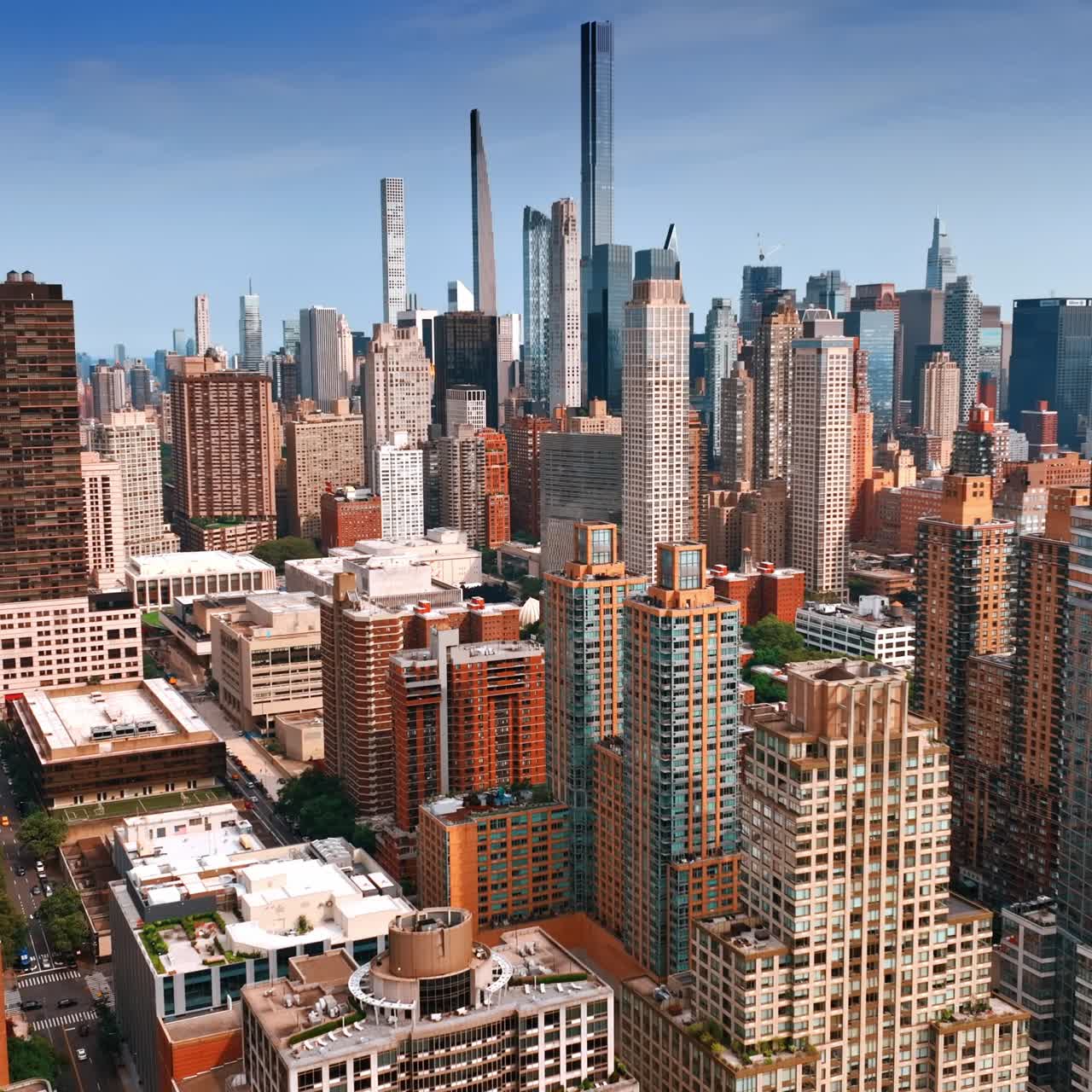 Striking and diverse skyscrapers of New York midtown. Beautiful architecture footage on sunny daytime