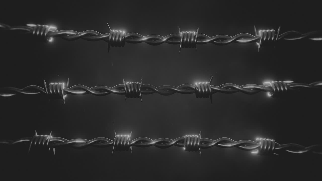 горизонтально движущаяся черно-белая колючая проволока