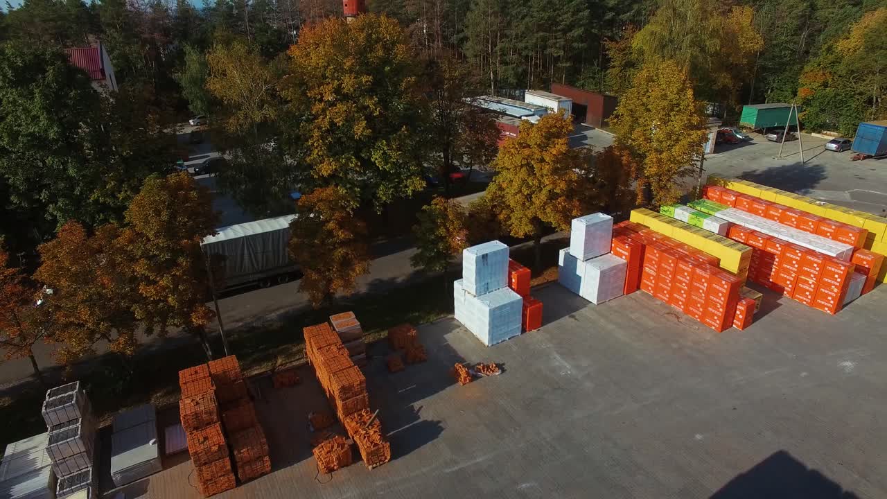 Large distribution warehouse. Aerial view of building materials warehouse