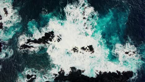 ocean waves crashing on rocks
