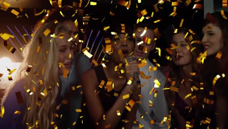 Animation-of-confetti-over-diverse-friends-singing-at-party