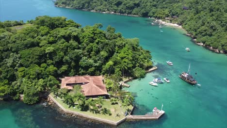 island in crystal clear water in brazilian ocean