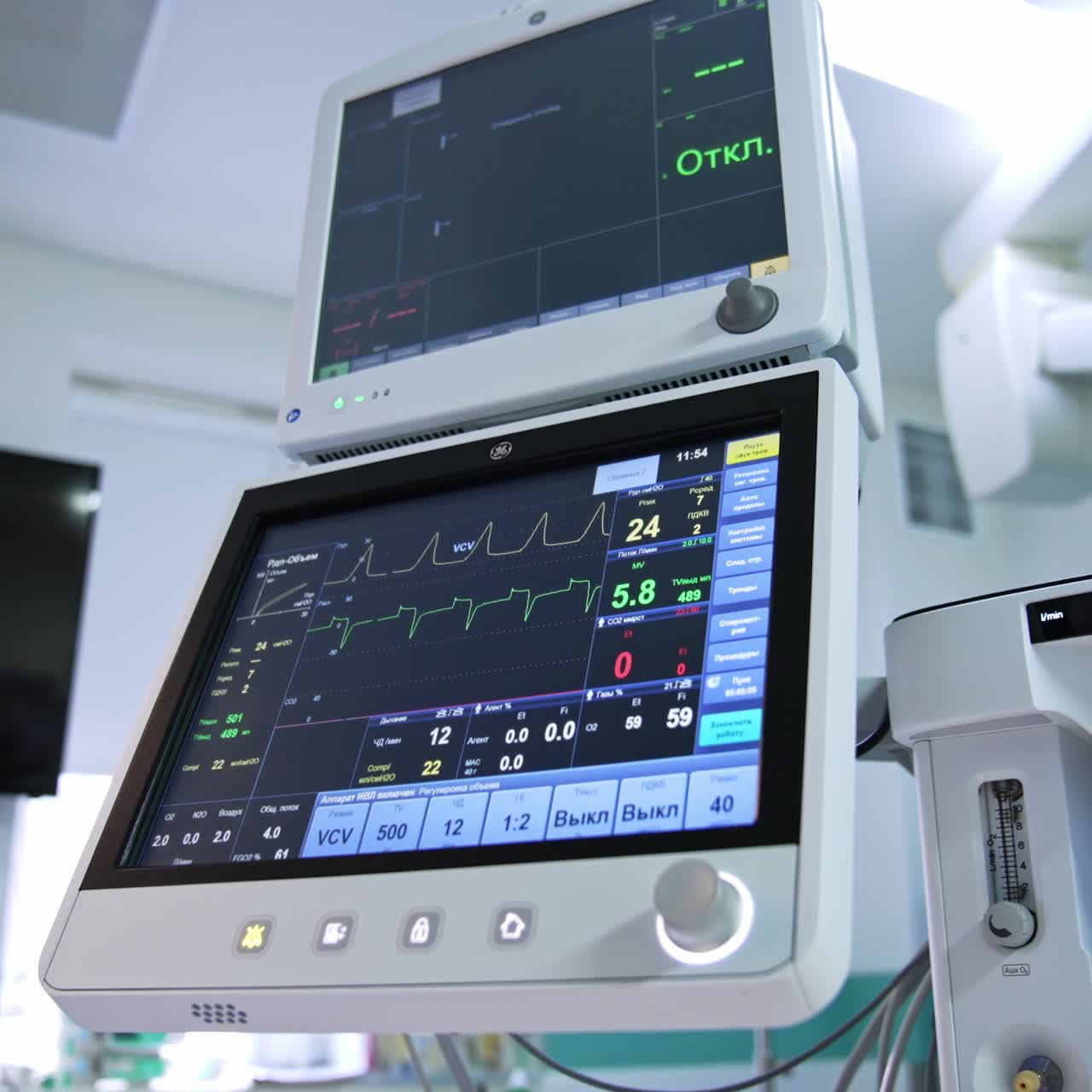 Two screens of artificial lung ventilator. Low angle view. Equipment necessary for modern surgeries in operational theatre