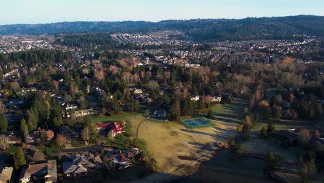 4K-aerial-drone-shot-looking-down-over-Pacific-Northwest-grass-terrain