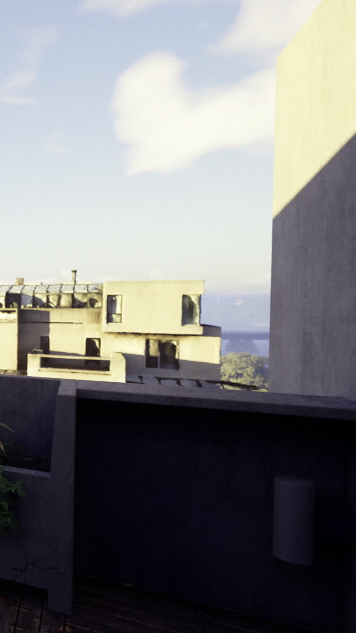 View of modern building near water with plants in foreground during daytime
