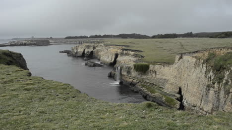 coastal waterfall and bluffs at point arena california