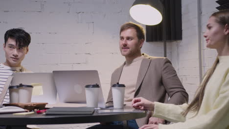 group of diverse colleagues having a team meeting in the boardroom 1