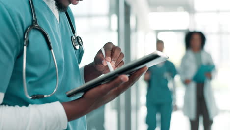 medical professionals using technology in a hospital setting