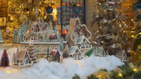 miniature houses in snowy village christmas decoration display in ashland, oregon