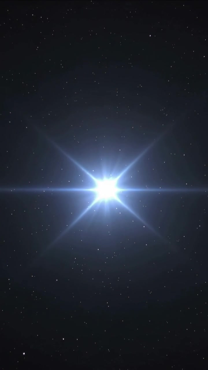 Video verticale: Nucleo di stella che si illumina e si infiamma, producendo bagliori dell'obiettivo e raggi di diffrazione nello spazio