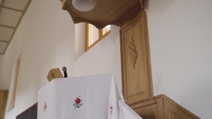 Pulpit and microphone at front of reformed church