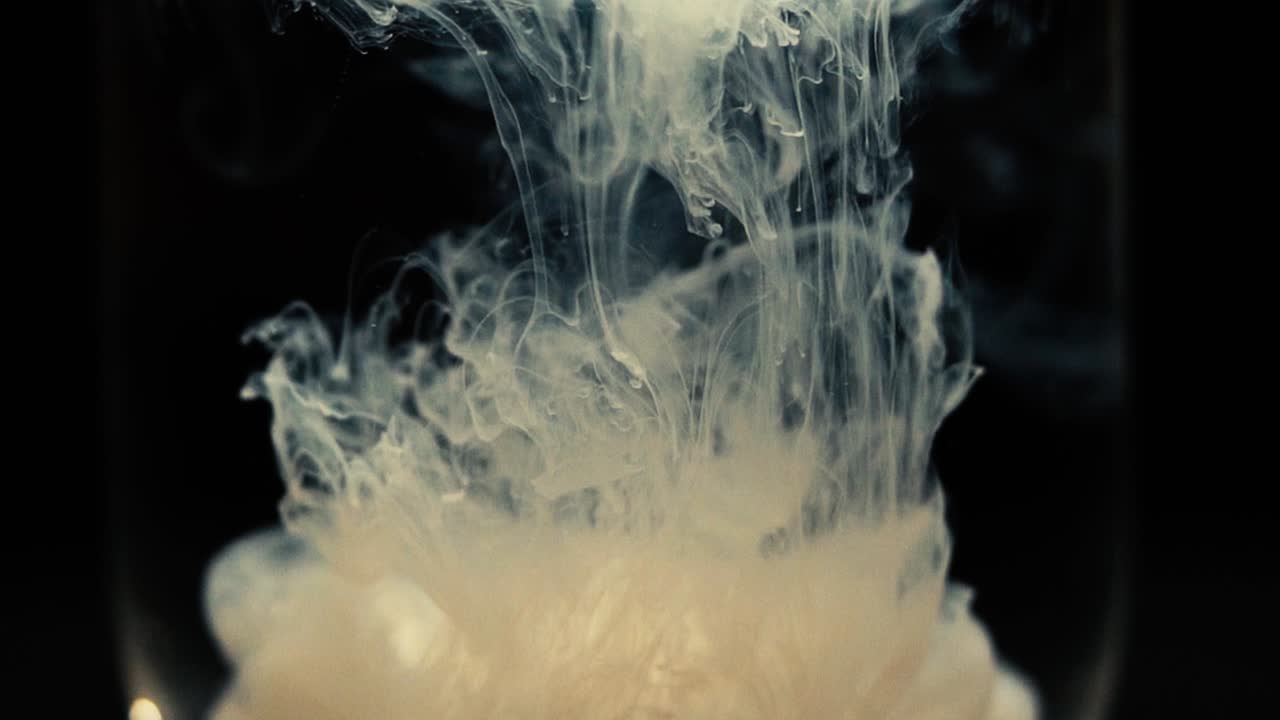 Slowmotion shot showing paint floating in water. Shot with the Sony a7iii