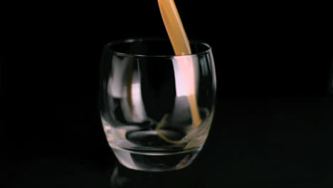 Fruit-juice-poured-in-super-slow-motion-