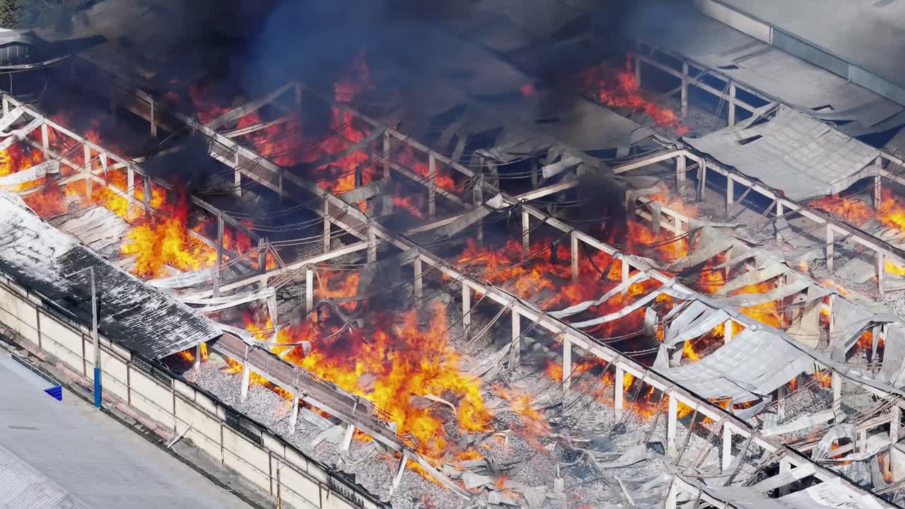 Massive Factory Fire: Aerial View of Devastating Blaze