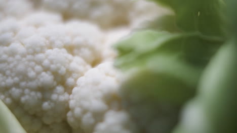slow slider shot of fresh raw organic cauliflower health food natural vegetation macro close focus