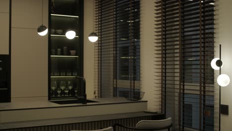 modern minimalist apartment interior featuring simple decor, neutral tones, and clean lines. the design emphasizes functionality, creating a serene and organized living space.
