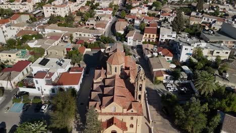 saint barbara eastern orthodox church in the kaimakli suburb of nicosia, cyprus. aerial pullback shot