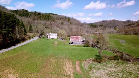 aerial zoom into farm in valle crucis nc in 4k