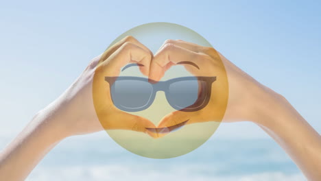 sunglasses smiley and heart with hands