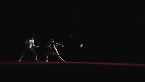 two fencers in action