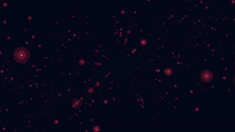 puntos rojos vibrantes en formación circular sobre un fondo negro - arte abstracto