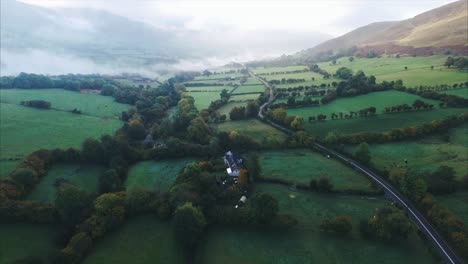 an aerial view of farmland in wales