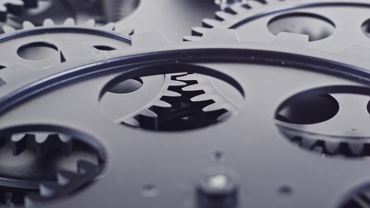 Close Up Shot Of  Black Gear Cogs Rotating