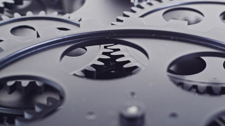 Close Up Shot Of Black Gear Cogs Rotating