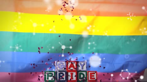 Animation-of-falling-confetti-rainbow-flag-and-gay-pride-text