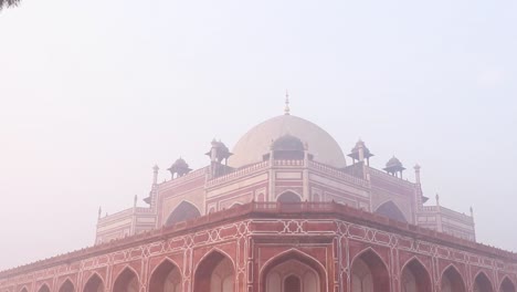 humayun tomb at misty morning from unique perspective shot is taken at delhi india