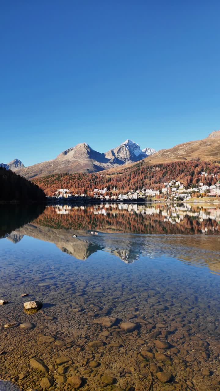 Picturesque view of Lake St. Moritz in Switzerland, nestled in the Alps