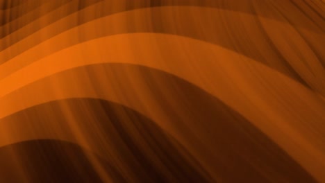 Animation-of-orange-lines-and-waves-over-black-background