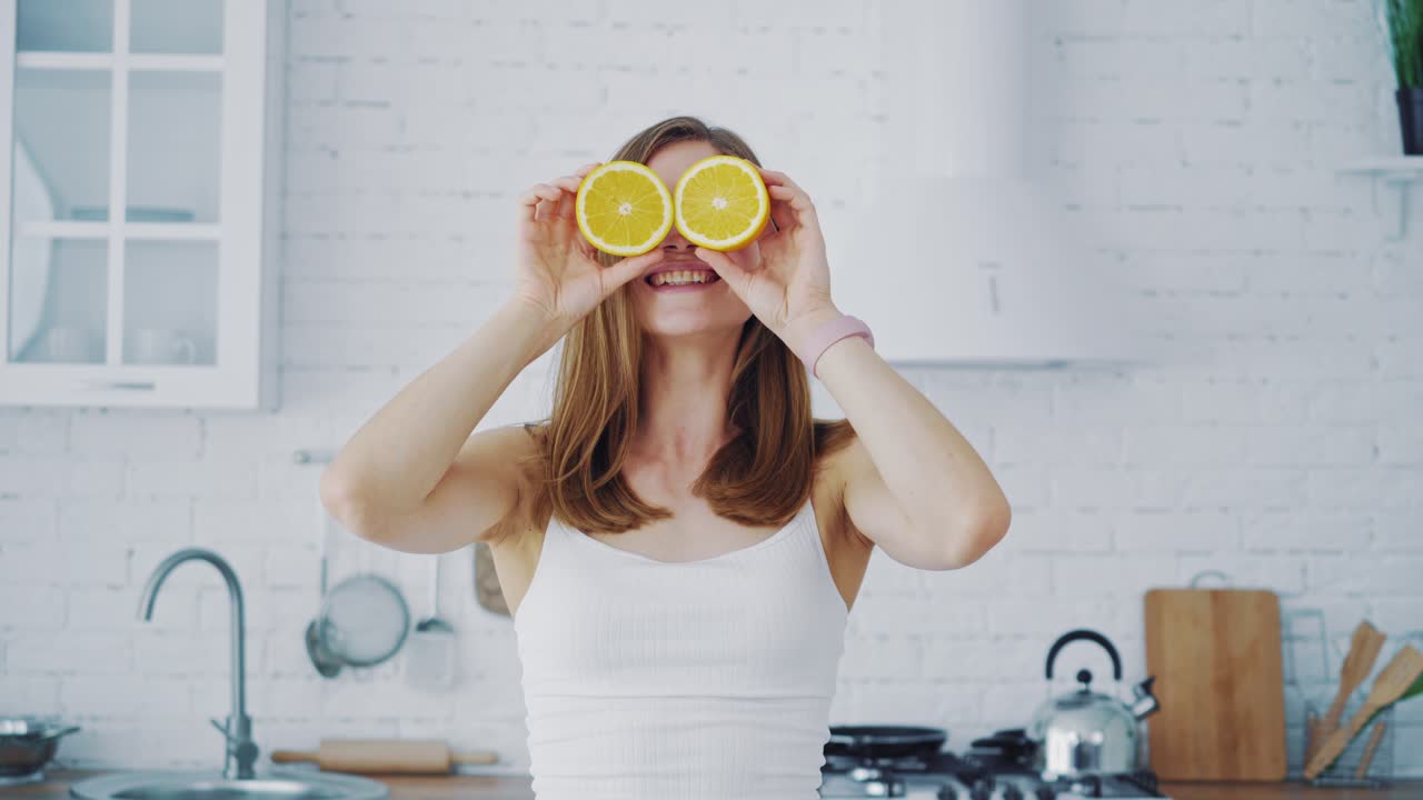 Happy woman with orange eyes. Portrait of smiling woman with orange smile